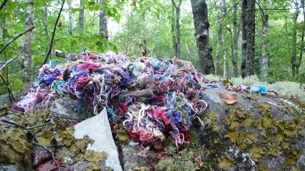 "Threads," wool, linen and cotton threads, installation on the artist's property